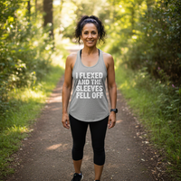 Load image into Gallery viewer, i FLEXED AND THE SLEEVES FELL OFF printed on Women's Ideal Racerback Tank